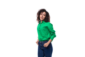 cute young woman with black curly hair dressed in a green shirt