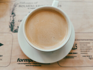 cup of coffee with newspaper