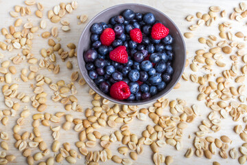 bowl of oatmeal with fruit and nuts