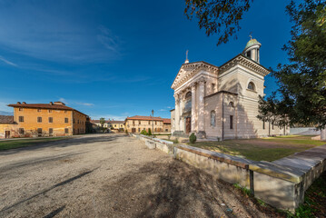 Fototapeta na wymiar Villastellone, Turin, Italy - November 18, 2023: Borgo Cornalese with the Beata Vergine dei Dolori Church and ancient farmsteads