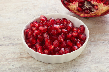 Ripe red Pomegranate seeds in the bowl