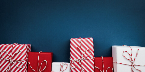 Gift boxes on color background, flat lay, space for text