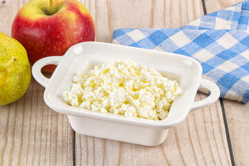 Organic cottage cheese in the bowl