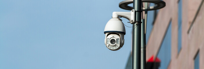 Security camera mounted on pole
