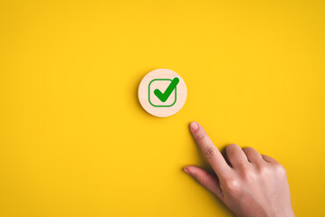 Hand with checklist icon for successful target goal business management, Business strategy planning management, Business process and workflow development, Survey and quality control assessment