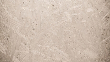 particleboard chipboard background with grainy texture of particle presses wooden panel or osb...