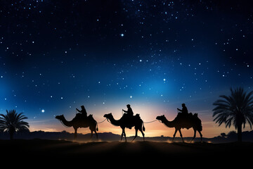Silhouette of the three wise men traveling on camels to Bethlehem for the birth of baby Jesus