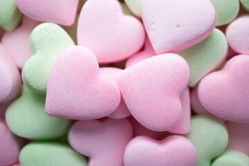 Obraz na płótnie Canvas Valentine's Day Candy Conversation Hearts - Sweet Love in Pink and Green for Holiday Celebrations