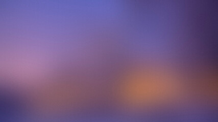 Dreamy purple and yellow soft sunset grainy textured gradient background. Abstract soft, blurred and dark multi-colored background with noise. Copy space.