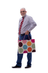 Old businessman holding bag isolated on white
