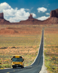 Americana roadtrip Monument Valley wild west in a yellow school bus