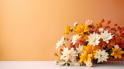  a vase filled with yellow and white flowers on top of a table next to an orange wall and a vase filled with orange and white flowers.