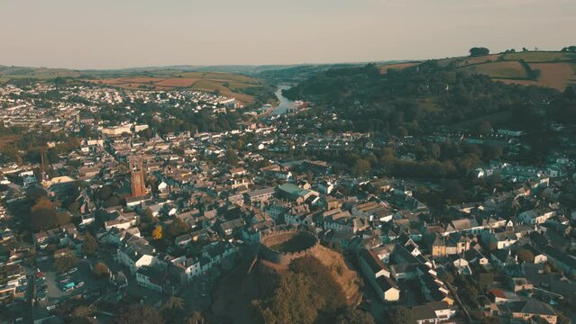 Aerial drone shot of old castle ruins in town of Totnes, Devon, UK