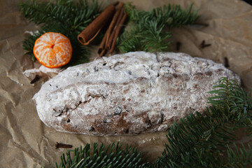 Christmas traditional fruit bread stollen. Traditional Christmas festive pastry dessert. Stollen for Christmas
