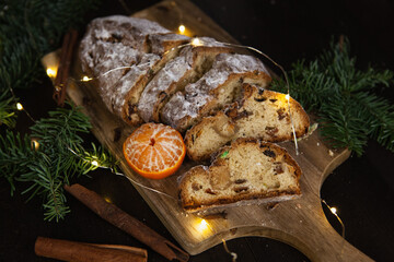 Christmas traditional fruit bread stollen. Traditional Christmas festive pastry dessert. Stollen for Christmas