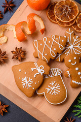 Beautiful festive Christmas composition of tangerines, gingerbread and star anise