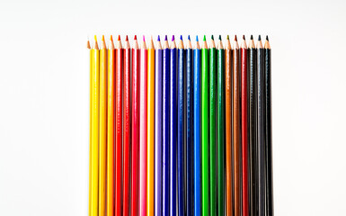 Obraz premium A Vibrant Array of Colored Pencils Creating a Beautiful Spectrum. A group of colored pencils sitting next to each other