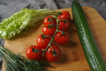 salad ingredients, tomato, cucumber, lettuce, dill 