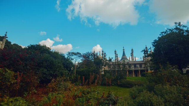 A wide angle panning shot of the Royal Pavilion in Brighton, England, UK on a sunny day. The Royal Pavilion, also known as the Brighton Pavilion, is a former royal residence built in 1787.