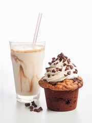 Glass of cold latte and chocolate cupcake with whipped cream frosting on white background.