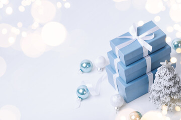 Christmas blue gifts with decorations on white background