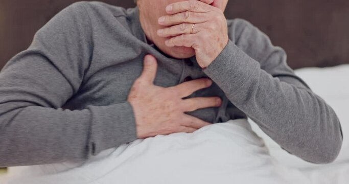 Senior man coughing with chest infection, allergies or sickness in bed in retirement home. Medical, recovery and closeup of elderly male patient resting with cold or sickness in his modern house.