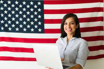 Portrait of a happy patriot woman applying for the american visa