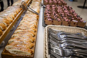 Candy bar with different sweet desserts and cupcakes. Selective focus
