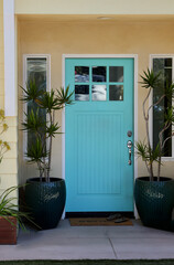 charming beach cottage with bright aqua front door