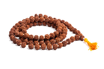 Buddhist or Hinduist Japa mala (prayer beads) made of rudraksha isolated - 680316578