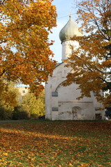 autumn in the park,  old church and golden autumn 