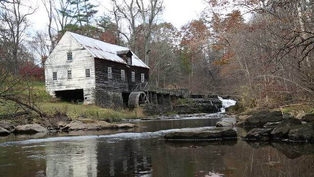 abandoned historic mill on stream (grain milling stone, water mill wheel) scenic rustic country building landmark (griding) rest plaus marbletown waterfall (still, pan up, down) footage