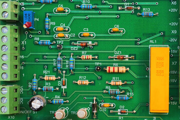 electronic circuit board with various components ideal for use as a background