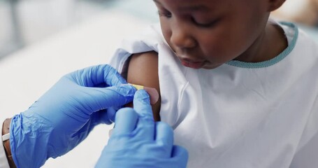 Doctor, patient and plaster for vaccine, virus protection and immunization booster or flu shot. Black child, injection and bandage on wound, medicine and treatment for health, trust and support - Powered by Adobe