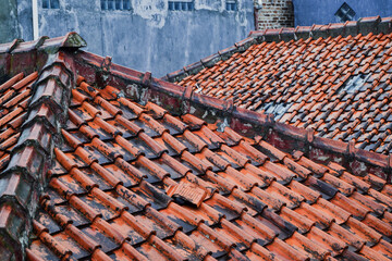 Fototapeta premium One of the wet roof tile miss the line, i took a picture after the rain from balcony.