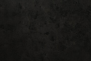 Texture of black stone surface as background, closeup