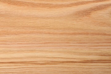 Fototapeta premium Texture of wooden cutting board as background, top view