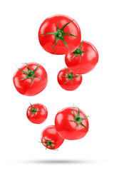 Fresh ripe tomatoes falling on white background