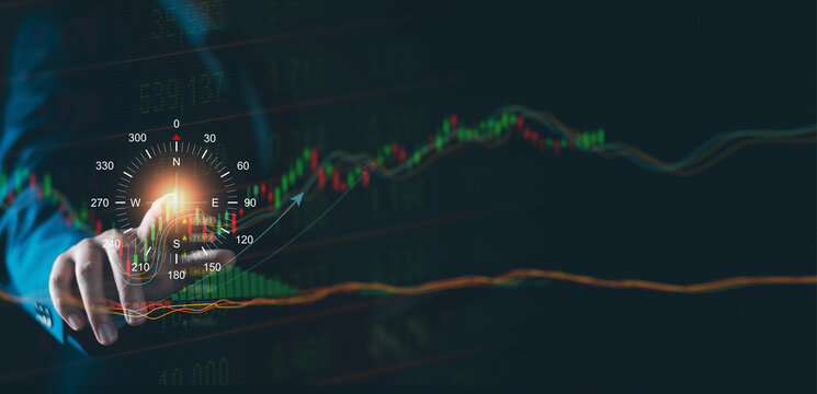 Business compass navigate recovery concept. Businessman drawing business growth graph and compass of navigate guiding global market direction, business strategy, finance accounting, global economy - Powered by Adobe