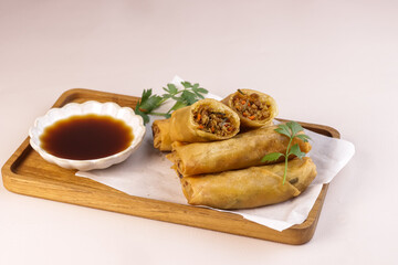Harumaki is Japanese Spring Roll With Soy Sauce.