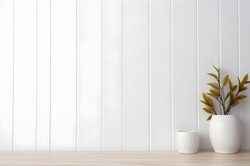 Pot plant on a white wooden table against a white wooden wall for displaying purposes. High quality photo.