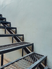 design of iron staircase access to upper floor 