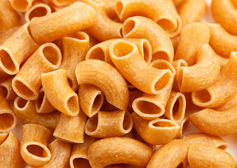 Macro Background of Gluten Free Dry Brown Rice Elbow Macaroni Pasta