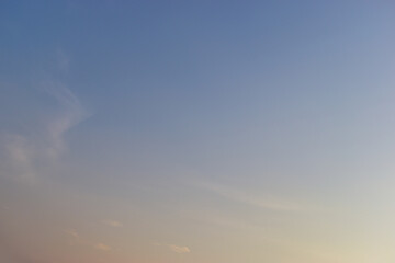 beautiful blue sky and cloud with golden ray sunrise in the morning, natural background