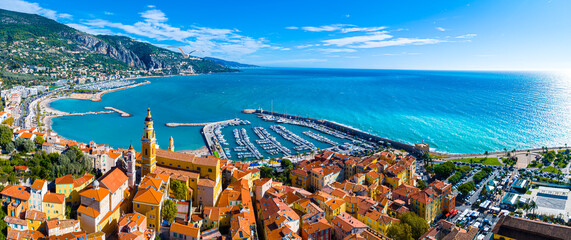 View of Menton, a town on the French Riviera in southeast France known for beaches and the Serre de la Madone garden - obrazy, fototapety, plakaty