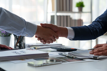 Businessman shaking hands with partner. Greeting. Business joint venture concept. For business...