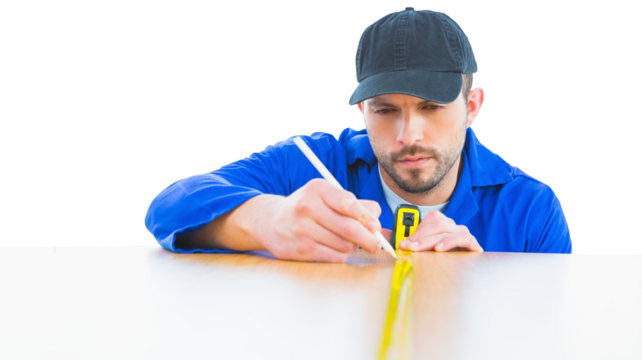Digital png photo of caucasian male worker measuring table on transparent background - Powered by Adobe