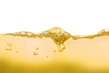 Appearance surface poured brownish yellow lubricant liquid for bubbles background can use cooking...