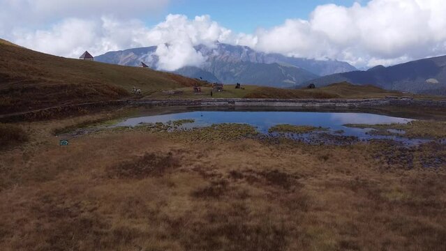 Ascending drone footage of Bedni Bugyal meadow near near Wan village in Chamoli, Uttarakhand, India