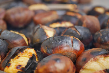 traditional Istanbul street food grilled chestnuts in a row